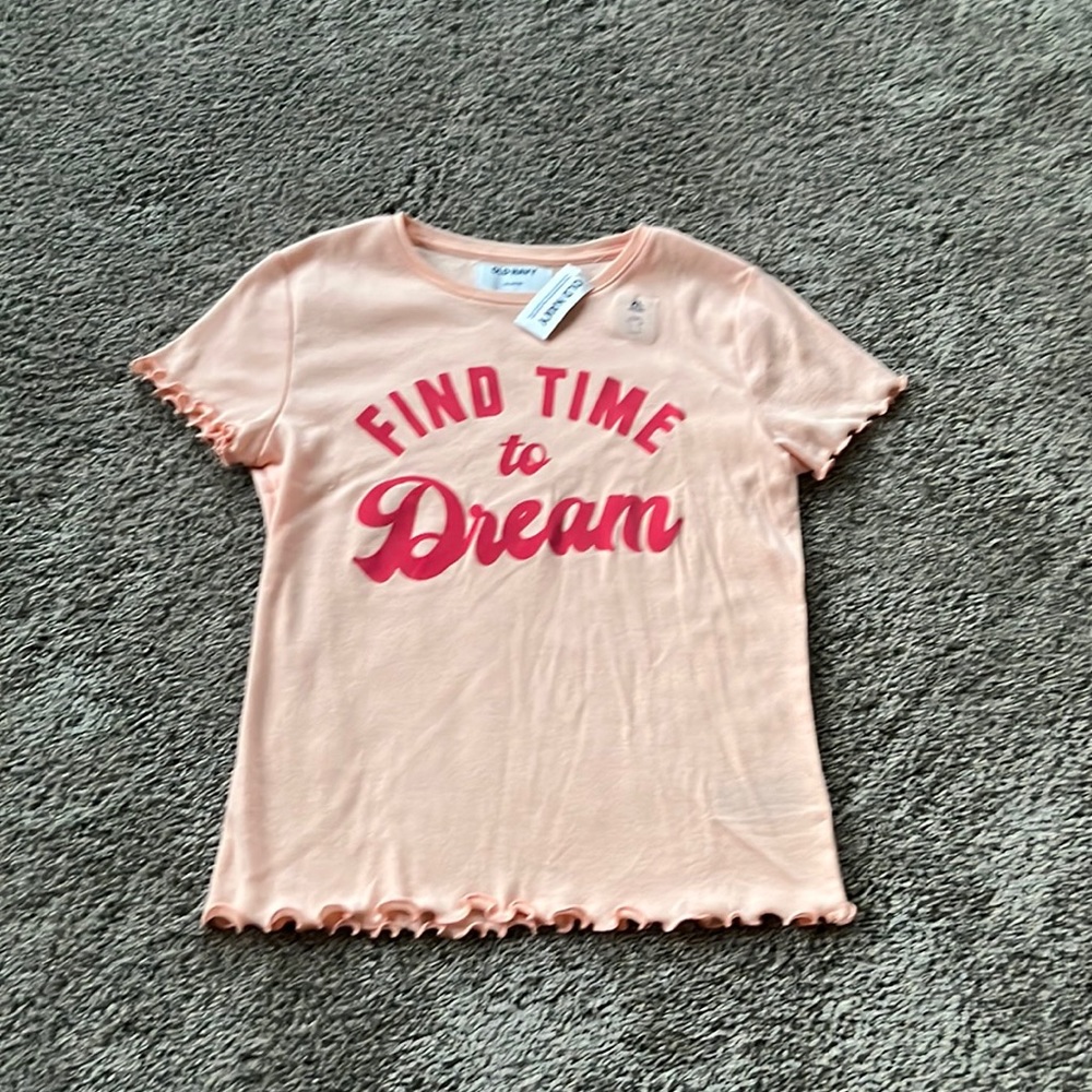 i’m selling a top.The brand is old navy. it is a size XL (14-16) kids.